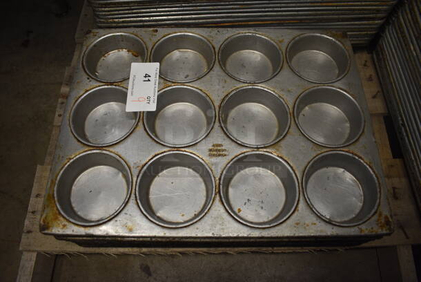 9 Metal 12 Cup Muffin Baking Pans. 15.5x20.5x2. 9 Times Your Bid!