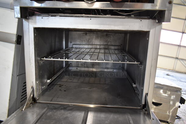 Thermatek Stainless Steel Commercial Natural Gas Powered 4 Burner Range w/ Oven and Back Splash. Missing 2 Legs. - Image 7 of 9