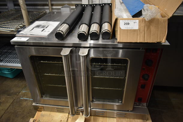 BRAND NEW SCRATCH AND DENT! Mainstreet Stainless Steel Commercial Electric Powered Full Size Convection Oven w/ View Through Doors, Metal Oven Racks and Thermostatic Controls. Comes w/ Metal Legs. 208 Volts, 1/3 Phase. - Image 1 of 7