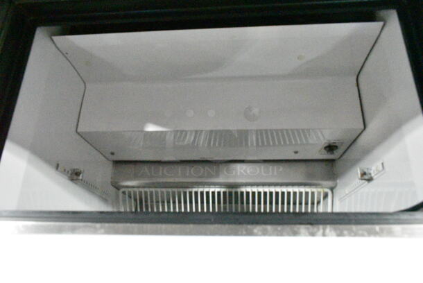 True TSSU-27-08 Stainless Steel Commercial Sandwich Salad Prep Table Bain Marie Mega Top on Commercial Casters. 115 Volts, 1 Phase. Tested and Powers On But Does Not Get Cold - Image 3 of 8