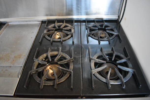 Viking Stainless Steel Commercial Natural Gas Powered 6 Burner Range w/ Center Flat Top Griddle, 2 Ovens and Backsplash. 48x30x50 - Image 4 of 8