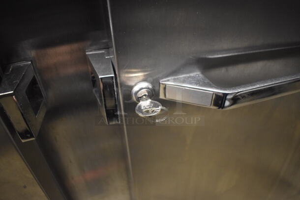 Continental 2RE Stainless Steel Commercial 2 Door Reach In Cooler on Commercial Casters. 115 Volts, 1 Phase. 57x34x82. Tested and Working! - Image 5 of 6