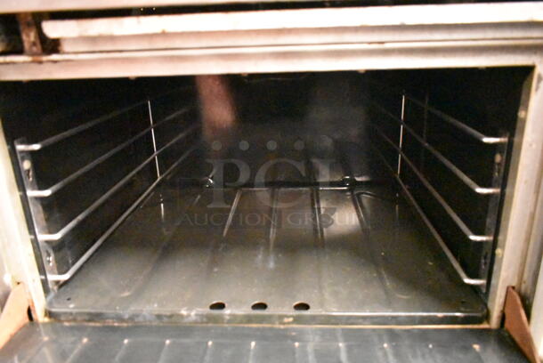 Garland PS-24G-6-2628 Stainless Steel Commercial Natural Gas Powered 6 Burner Range w/ Left Side Flat Top, 2 Ovens, Over Shelf and Back Splash.  - Image 7 of 11