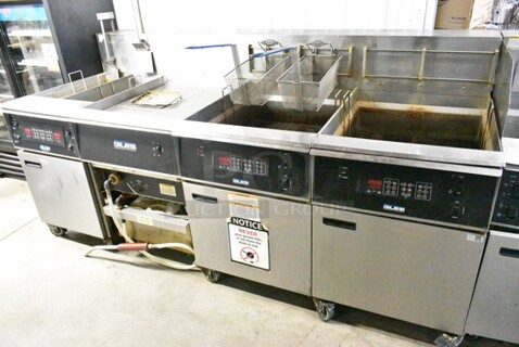 Giles EOF-24 Stainless Steel Commercial Electric Powered 3 Bay Fryer w/ Dumping Station on Commercial Casters. 480 Volts, 3 Phase.