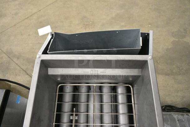 BRAND NEW SCRATCH AND DENT! Vulcan 1VEG50M-1 Stainless Steel Commercial Floor Style Natural Gas Powered Deep Fat Fryer. Missing Back Piece. 85,000 BTU  - Image 5 of 7