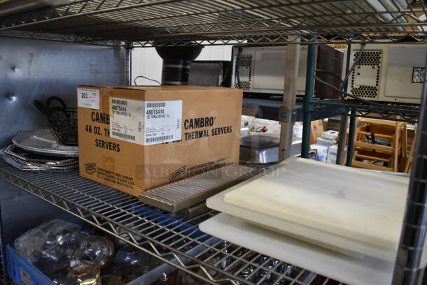 ALL ONE MONEY! Tier Lot of Various Items Including Metal Trays, NEW Cambro Poly Thermal Servers and Cutting Boards