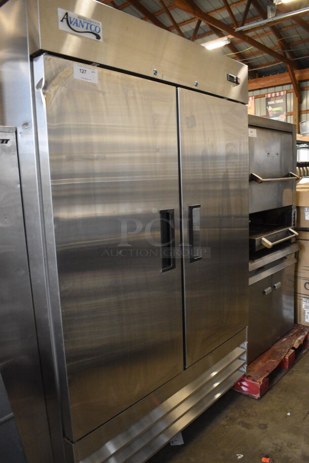 BRAND NEW SCRATCH AND DENT! Avantco Model 178A49FHC Stainless Steel Commercial 2 Door Reach In Freezer w/ Poly Coated Racks on Commercial Casters. 115 Volts, 1 Phase. 54x32.5x83.5. Tested and Working!