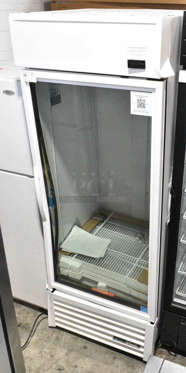 BRAND NEW SCRATCH AND DENT! 2024 True TSCI-600R-G-PH Metal Commercial Single Door Reach In Cooler Merchandiser w/ Poly Coated Racks. 115 Volts, 1 Phase. Tested and Powers On But Does Not Get Cold - Image 1 of 9
