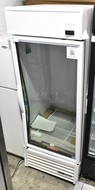 BRAND NEW SCRATCH AND DENT! 2024 True TSCI-600R-G-PH Metal Commercial Single Door Reach In Cooler Merchandiser w/ Poly Coated Racks. 115 Volts, 1 Phase. Tested and Powers On But Does Not Get Cold