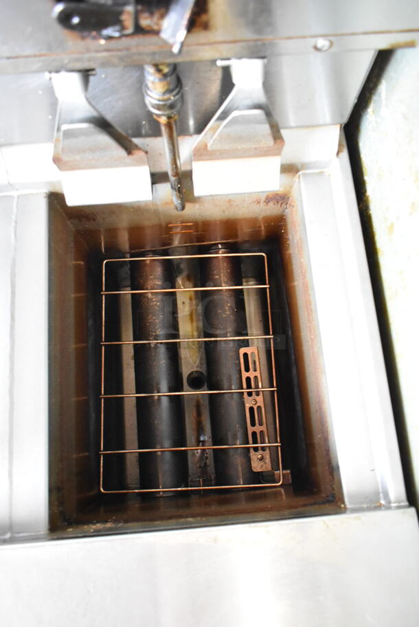 2020 Henny Penny OGA-323 ENERGY STAR Stainless Steel Commercial Natural Gas Powered 3 Bay Fryer w/ 3 Metal Fry Baskets on Commercial Casters. 255,000 BTU.  - Image 5 of 12