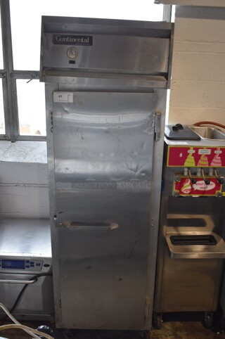 Continental 1R Stainless Steel Commercial Single Door Reach In Cooler w/ Racks on Commercial Casters. 115 Volts, 1 Phase. Tested and Powers On But Does Not Get Cold