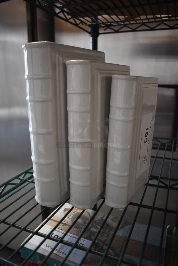 ALL ONE MONEY! Lot of 3 White Ceramic Fake Books. 5x2x8, 6x2x9, 7x2.5x10 - Image 1 of 5