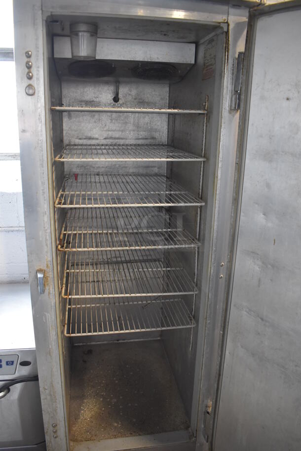 Continental 1R Stainless Steel Commercial Single Door Reach In Cooler w/ Racks on Commercial Casters. 115 Volts, 1 Phase. Tested and Powers On But Does Not Get Cold - Image 4 of 5