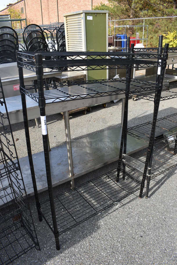 Black Finish 4 Tier Wire Shelving Unit. BUYER MUST DISMANTLE. PCI CANNOT DISMANTLE FOR SHIPPING. PLEASE CONSIDER FREIGHT CHARGES. 35.5x14x55 - Image 1 of 3