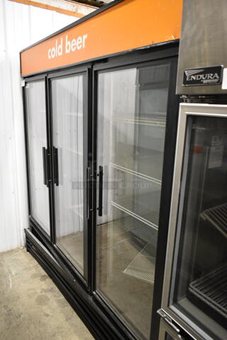 2014 True GDM-72 Metal Commercial 3 Door Reach In Cooler Merchandiser w/ Poly Coated Racks. 115 Volts, 1 Phase. Tested and Working!