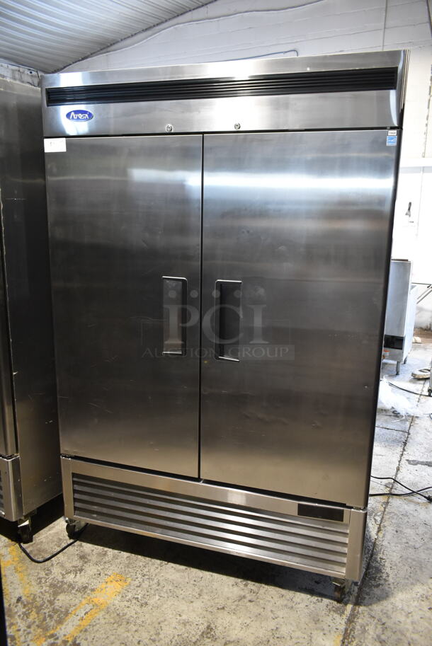 2020 Atosa MBF8503GR Stainless Steel Commercial 2 Door Reach In Freezer w/ Poly Coated Racks on Commercial Casters. 115 Volts, 1 Phase. Tested and Working!