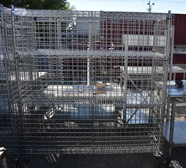 Chrome Finish 4 Tier Shelving Unit on Commercial Casters w/ Liquor Cage. BUYER MUST DISMANTLE. PCI CANNOT DISMANTLE FOR SHIPPING. PLEASE CONSIDER FREIGHT CHARGES. 62.5x25x67.5