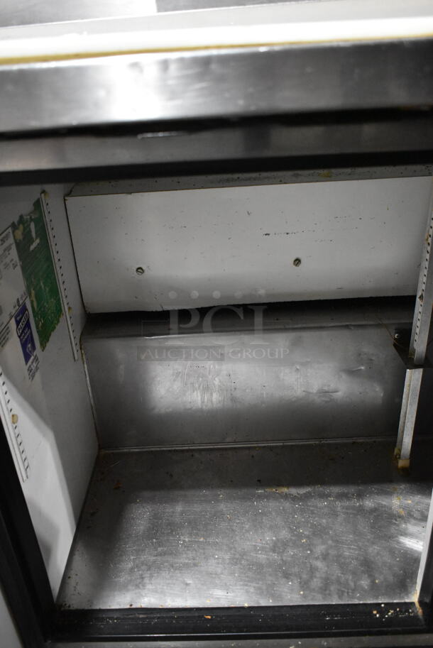 True TSSU-48-12 Stainless Steel Commercial Sandwich Salad Prep Table Bain Marie Mega Top on Commercial Casters. 115 Volts, 1 Phase. Tested and Powers On But Does Not Get Cold
 - Image 6 of 7