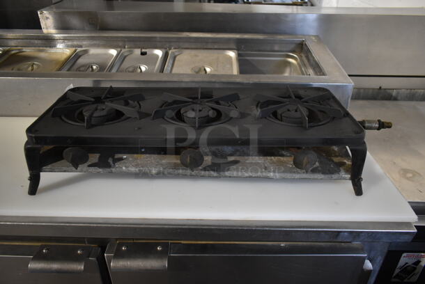 Metal Countertop Propane Gas Powered 3 Burner Range.  - Image 1 of 5