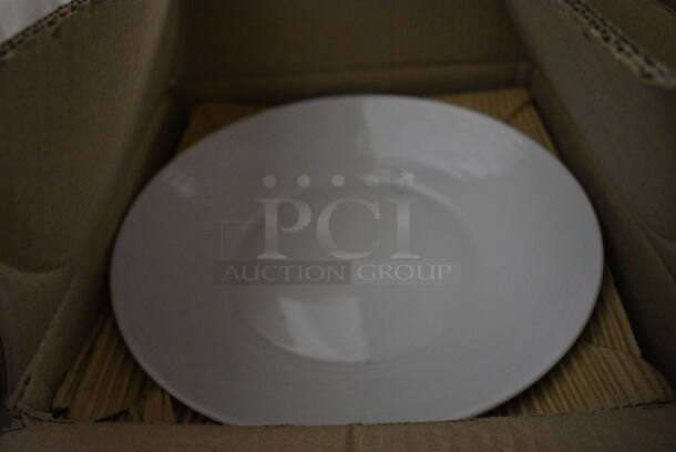 12 BRAND NEW IN BOX! Royal Porcelain Round White Plates. 11x11x1.5. 12 Times Your Bid! - Image 1 of 3