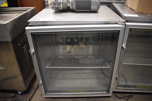 Silver King SKF27 Stainless Steel Commercial Single Door Undercounter Freezer Merchandiser on Commercial Casters. 115 Volts, 1 Phase. 27x29x31. Tested and Working!