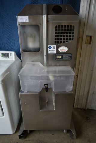 Fresh N Squeeze POS-1 Stainless Steel Commercial Floor Style Automatic Citrus Juicer on Commercial Casters. 120 Volts, 1 Phase. Tested and Working!