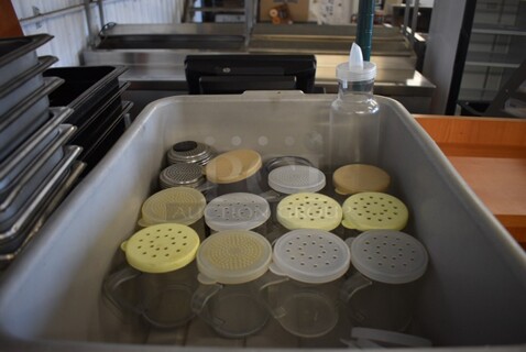 ALL ONE MONEY! Lot of Various Poly and Metal Shakers, Replacement Lids and Poly Oil Container in Gray Poly Bus Bin. Includes 4x3x4.