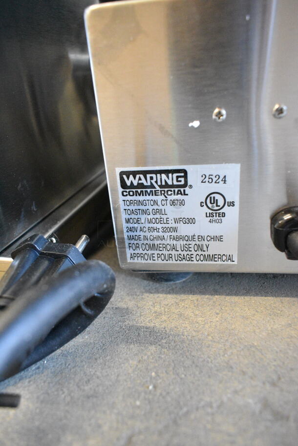 BRAND NEW SCRATCH AND DENT! 2024 Waring WFG300 Stainless Steel Commercial Tostato Ottimo Smooth Top & Bottom Dual Panini Sandwich Grill - 17" x 9 1/4" Cooking Surface. 240 Volts, 1 Phase.  - Image 9 of 9