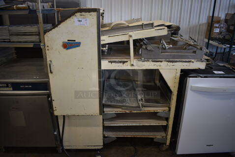 Moline Metal Commercial Floor Style Dough Sheeter on Commercial Casters. 250 Volts, 3 Phase. 56x30x55