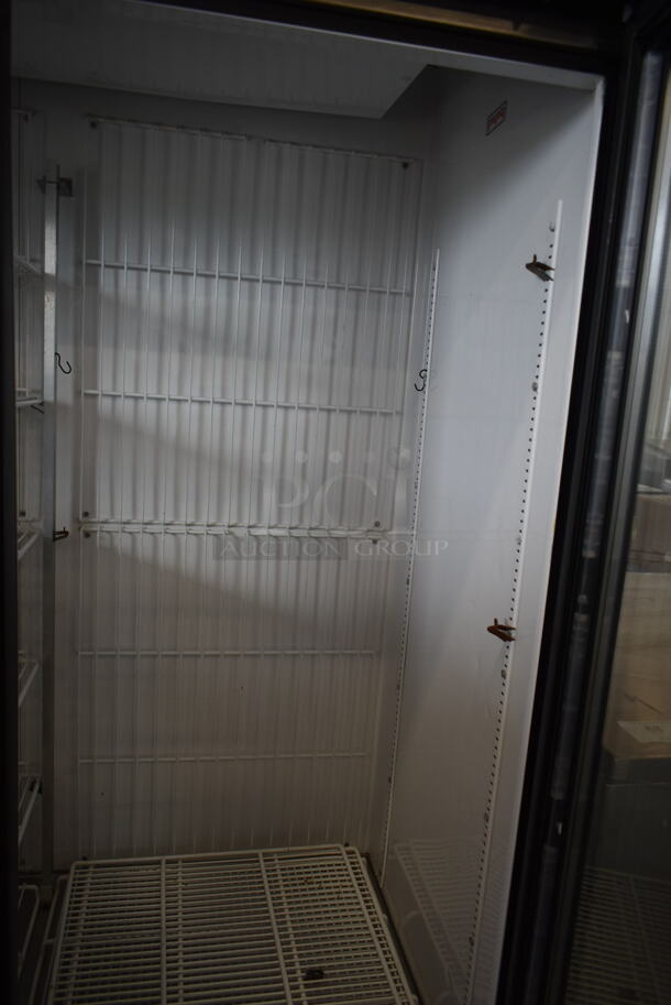True GDM-72F-LD ENERGY STAR Metal Commercial 3 Door Reach In Freezer Merchandiser w/ Poly Coated Racks. 115/208-230 Volts, 1 Phase.  - Image 2 of 5