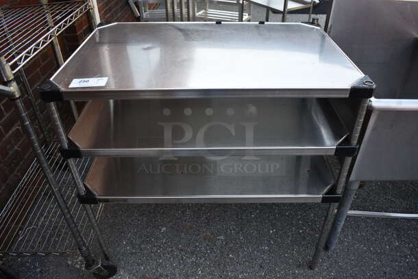 Chrome Finish 3 Tier Shelving Unit. BUYER MUST DISMANTLE. PCI CANNOT DISMANTLE FOR SHIPPING. PLEASE CONSIDER FREIGHT CHARGES. 36x24x35 - Image 1 of 3