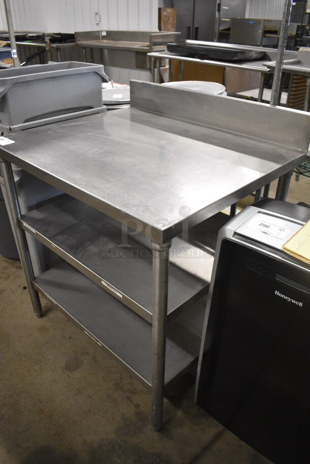 Stainless Steel Commercial Table w/ Back Splash and 2 Under Shelves. 36x30x41 - Image 2 of 4