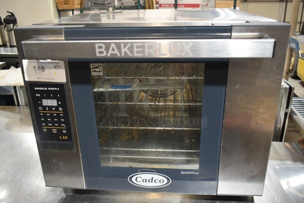 Cadco Unox XAFT-04HS-ELDV-US Stainless Steel Commercial Countertop Electric Powered Half Size Convection Oven. 208-240 Volts, 1 Phase.