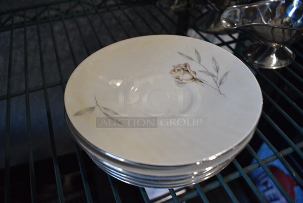 7 White Ceramic Saucers w/ Floral Pattern. 5.5x5.5x1. 7 Times Your Bid!