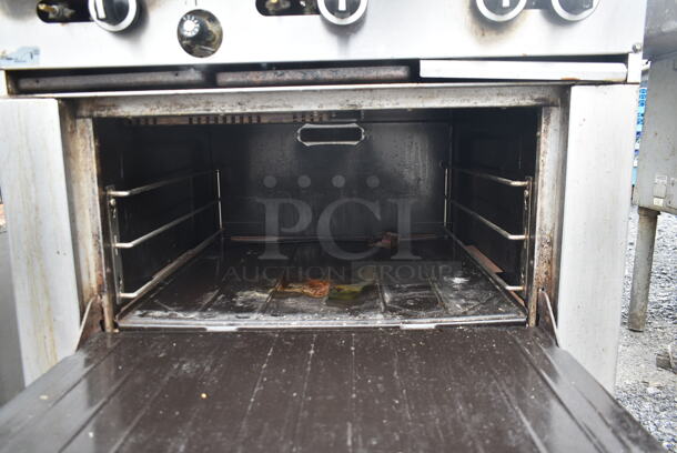 Garland G36-6R Stainless Steel Commercial Natural Gas Powered 6 Burner Range w/ Oven and Back Splash. - Image 5 of 7