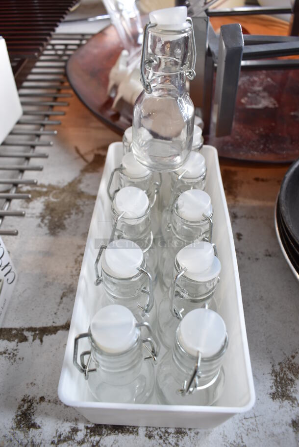 ALL ONE MONEY! Lot of Items on Tabletop Including Metal Bins, Metal Trays, White Poly Trash Can, Tealight Candles, Skillets, Glass Bottles and Glasses - Image 7 of 12