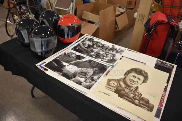 ALL ONE MONEY! Mario and Michael Andretti Racing Team Memorabilia Lot Including 4 Racing Helmets and 14 AUTOGRAPHED Various Pictures/Posters. See Pictures for Autographs. These Items Were Gifted to the Family After The Father Son Team Stayed as Guests.
