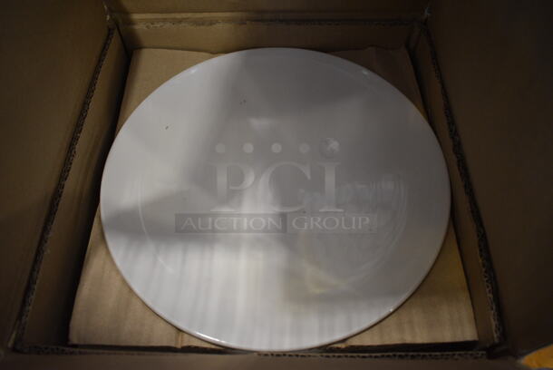 12 BRAND NEW IN BOX! White Ceramic Plates. 12.25x12.25x1. 12 Times Your Bid!