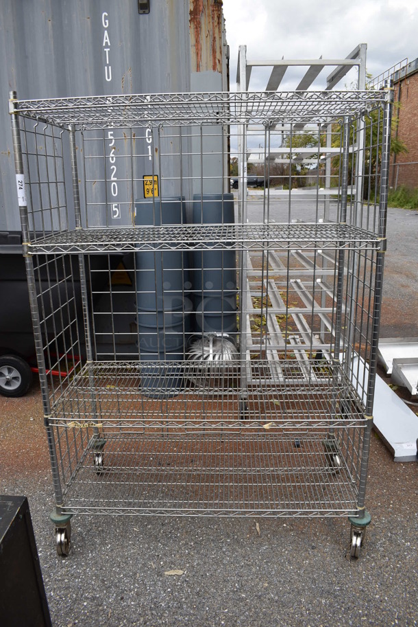 Chrome Finish 4 Tier Wire Shelving Unit on Commercial Casters. BUYER MUST DISMANTLE. PCI CANNOT DISMANTLE FOR SHIPPING. PLEASE CONSIDER FREIGHT CHARGES. 48x24x68 - Image 1 of 5