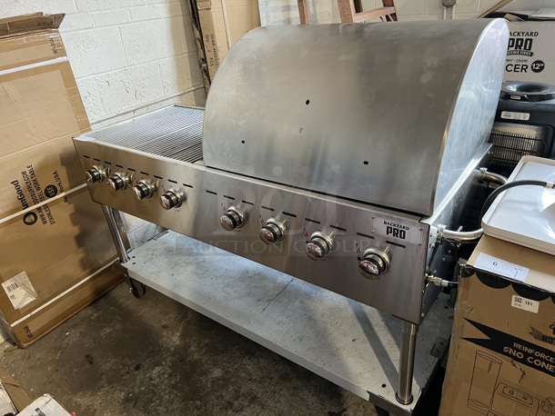 LIKE NEW! Backyard Pro Stainless Steel Propane Gas Powered Charbroiler Grill w/ Lid and Under Shelf on Commercial Casters. 67x26x34, 29x24x16