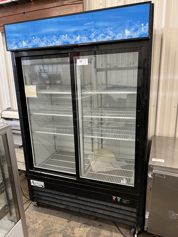 Avantco Model 178GDS47HCB Metal Commercial 2 Door Reach In Cooler Merchandiser w/ Poly Coated Racks on Commercial Casters. 115 Volts, 1 Phase. 53x30.5x84. Tested and Powers On But Does Not Get Cold