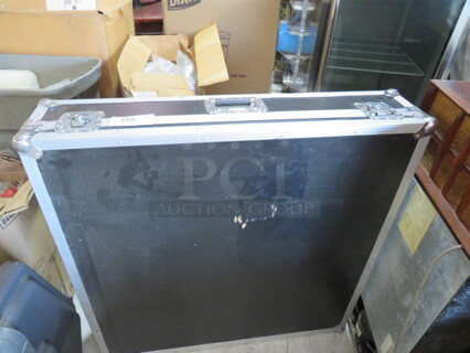 One Hard Shell Case With Wheel Spin Game. 40X40X9 