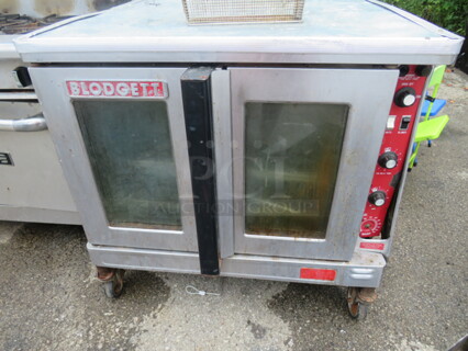 One Blodgett Electric Oven On Casters. 38X40X38.