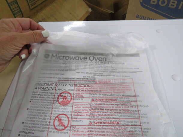 One NEW GE Microwave. 700 Watt. Model# JEM3072DHWW. 18X13X10. $191.43 - Image 2 of 4