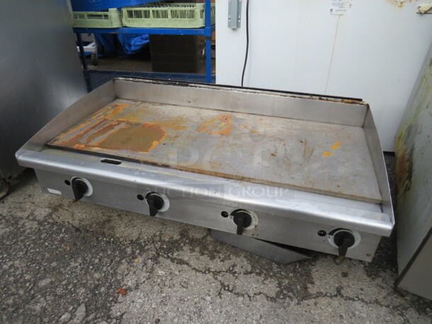 One Natural Gas 48 Inch Flat Top Griddle. 48X29X16. Working When Removed.