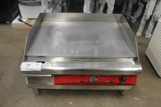BRAND NEW SCRATCH AND DENT! Avantco 177EG24N Stainless Steel Commercial Countertop Electric Powered Flat Top Griddle. 208/240 Volts.  - Image 1 of 6