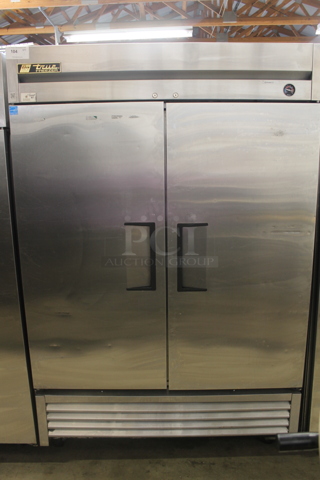 2014 True T-49F ENERGY STAR Stainless Steel Commercial 2 Door Reach In Freezer w/ Poly Coated Racks on Commercial Casters. 115 Volts, 1 Phase. Tested and Working!