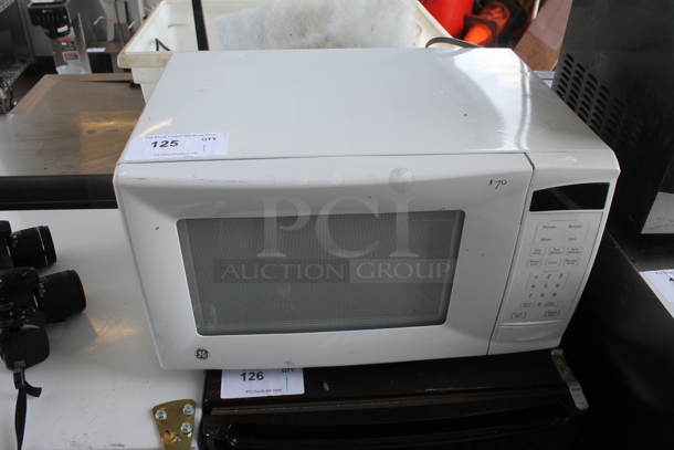 General Electric JES1139WL03 Countertop Microwave Oven. 120 Volts, 1 Phase.  - Image 1 of 5