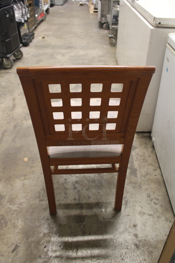 6 Items Including 5 Wooden Lattice Back Chairs With Patterned Cushioned Seat And 1 Round Table On X Prong Base. Cosmetic Condition May Vary. 6 Times Your Bid! 
Table: 59.5X59.5X30, Chairs: 18X16X36 - Image 4 of 7