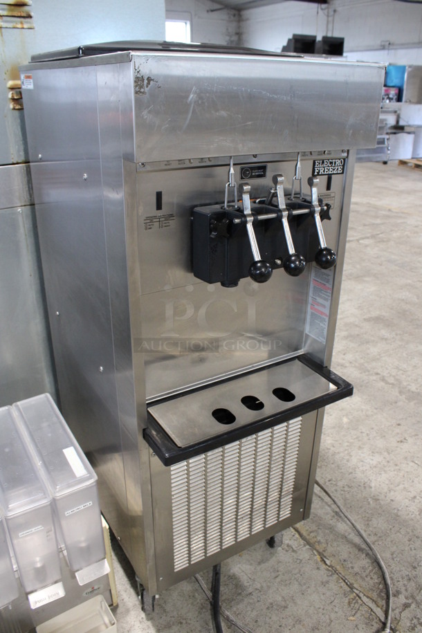 2013 Electro Freeze Model SL500-132 Stainless Steel Commercial Water Cooled Floor Style 2 Flavor w/ Twist Soft Serve Ice Cream Machine on Commercial Casters. 208-230 Volts, 3 Phase. 22x32x59 - Image 3 of 9